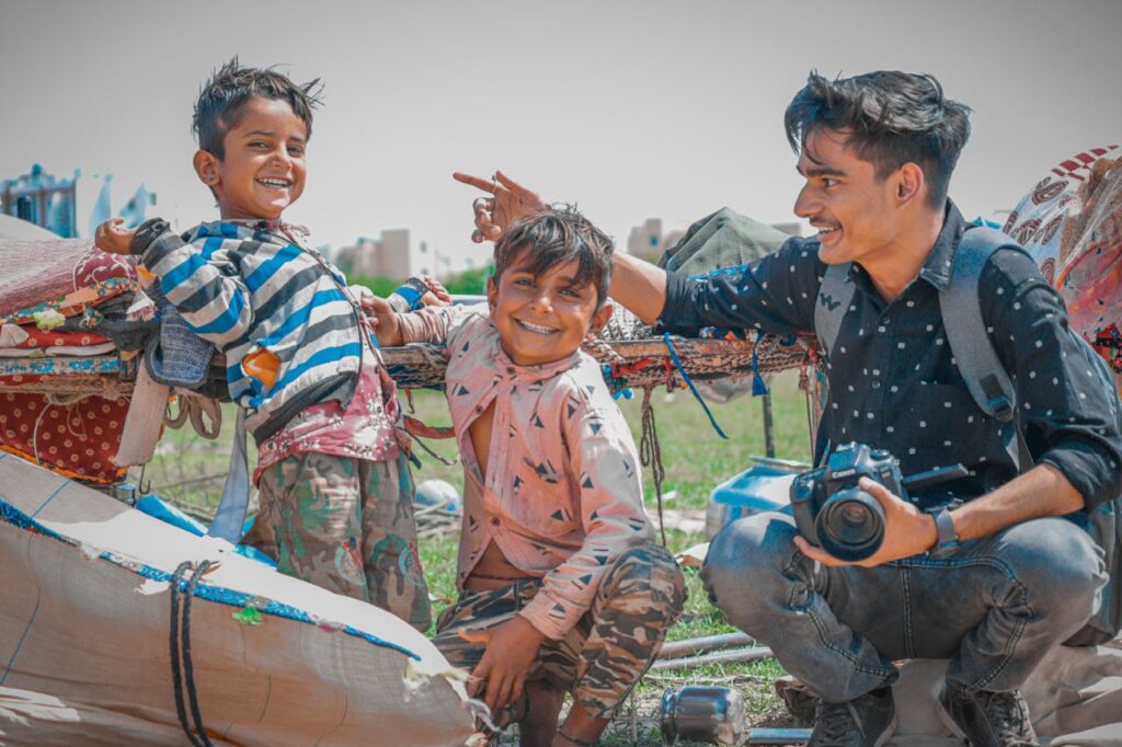 Smiling children enjoying a joyful moment outdoors in Bihar, India. A glimpse of happiness and friendship.